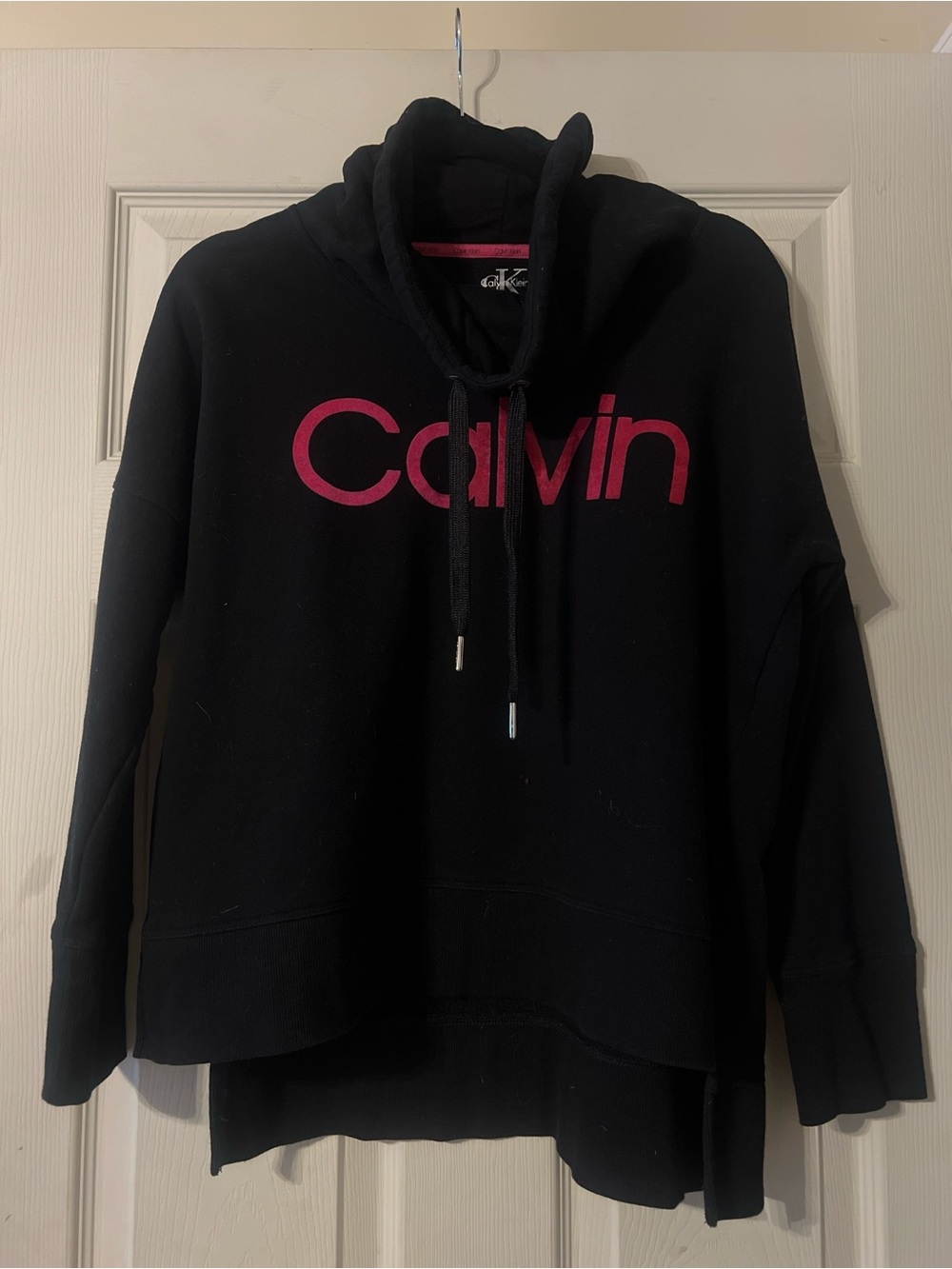 Calvin Klein Women's Black pullover with Pink Logo. Size M